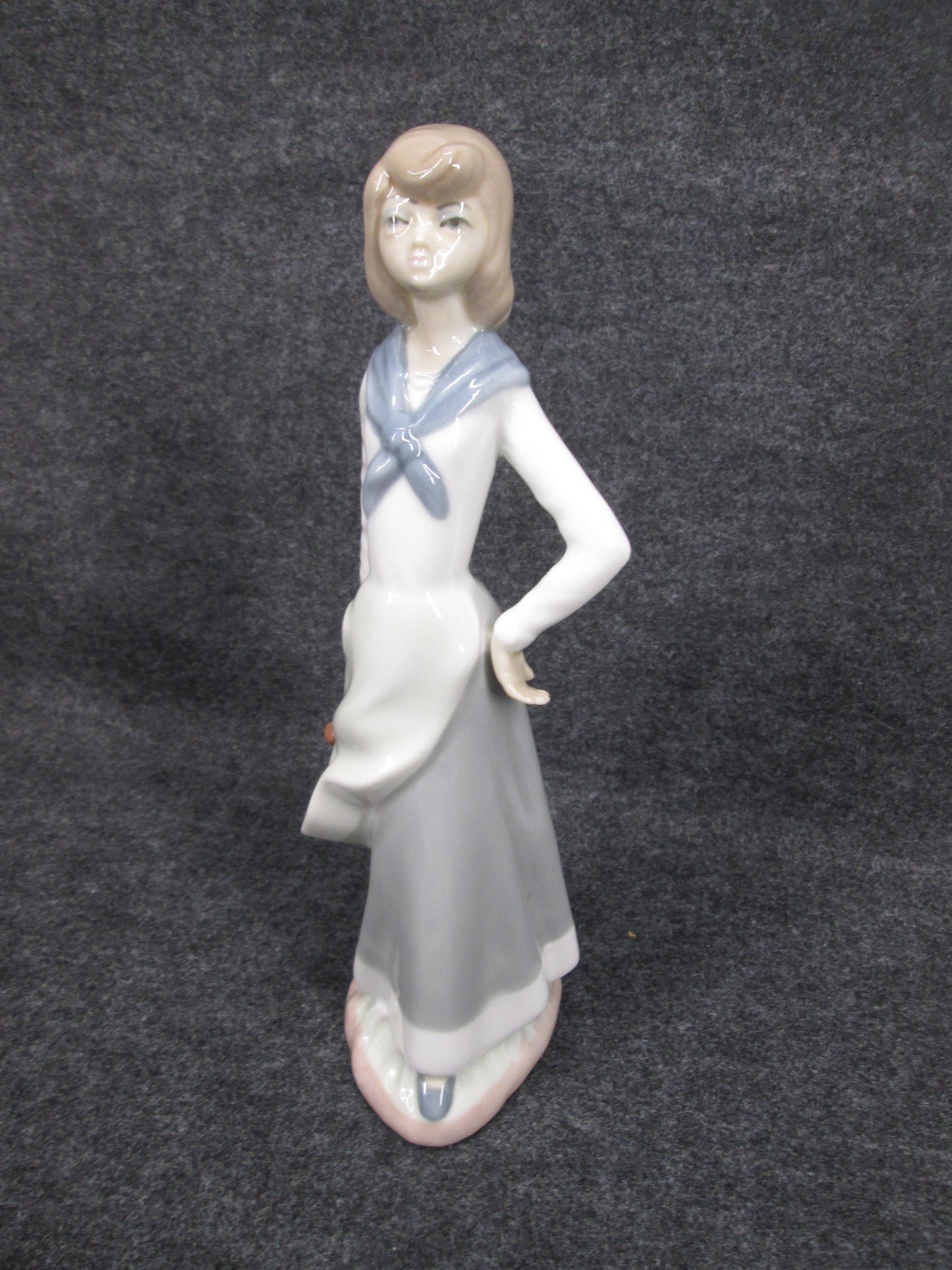 08259 - Cascades Porcelain Figurine Woman Holding Basket