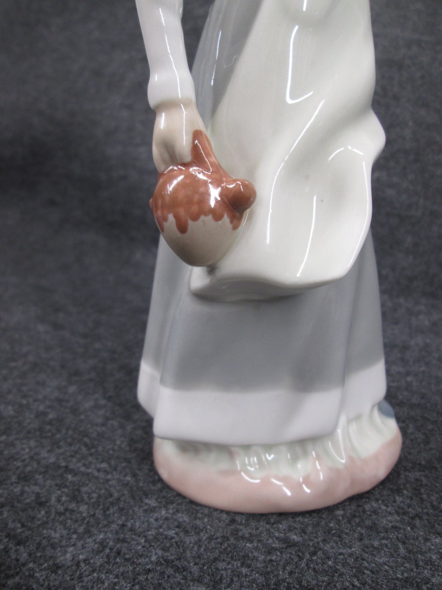 08259 - Cascades Porcelain Figurine Woman Holding Basket